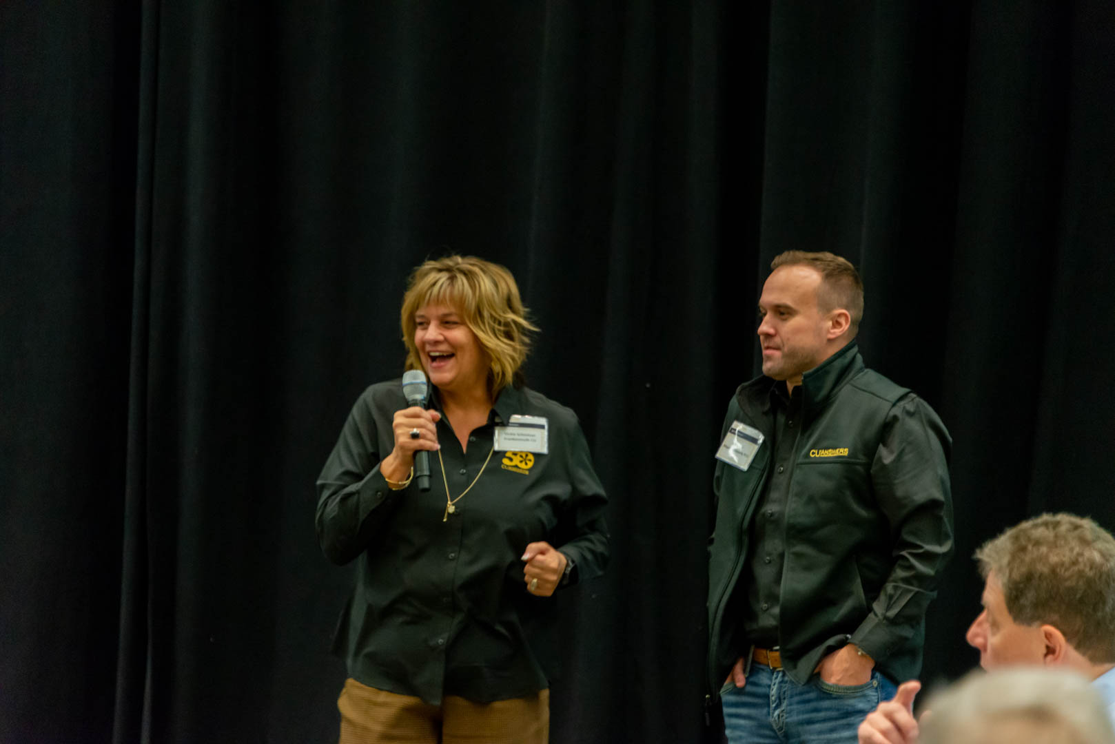 Frankenmuth Credit Union Vickie Schmitzer (left) and Allegan Community FCU CEO Kris Lewis (right), CU*Answers board members, discuss the state of the CUSO. 