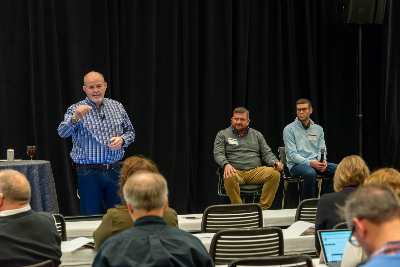 CU*Answers CEO Randy Karnes (left) is joined on stage by CU*Answers VPs Ken Vaughn (center) and Kristian Daniel (right), leaders of the Mobile Technologies Group. 