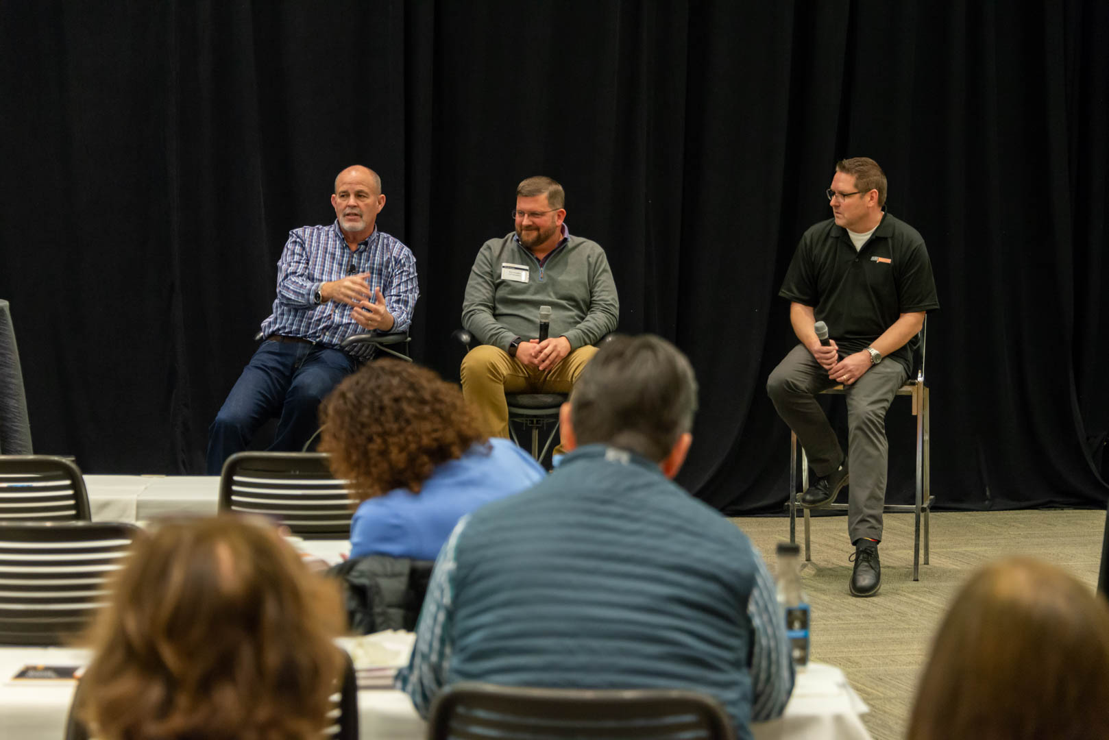 CU*Answers CEO Randy Karnes (left) is joined on stage by CU*Answers VP of Mobile Technologies Group Ken Vaughn (center) and VP of Marketing Services & Creative Director David Damstra. 