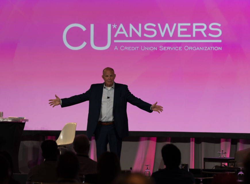 CU*Answers CEO Randy Karnes welcomes guests to the day's activities. 